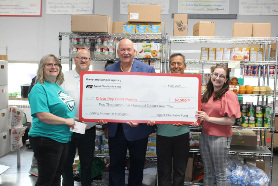 Tim & Brian presenting check to CCIEC